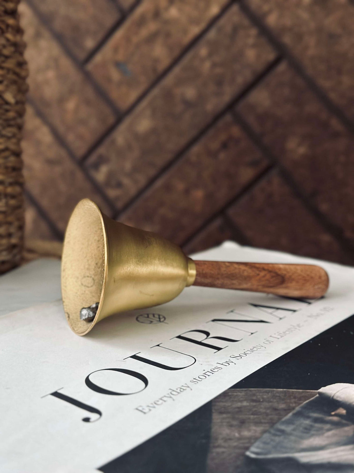 Bel met houten handgreep