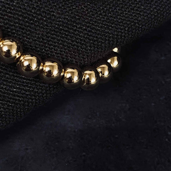 14 karat Guldbelagt armbånd sammensat af sirlige perler - VIAMAJA.DK