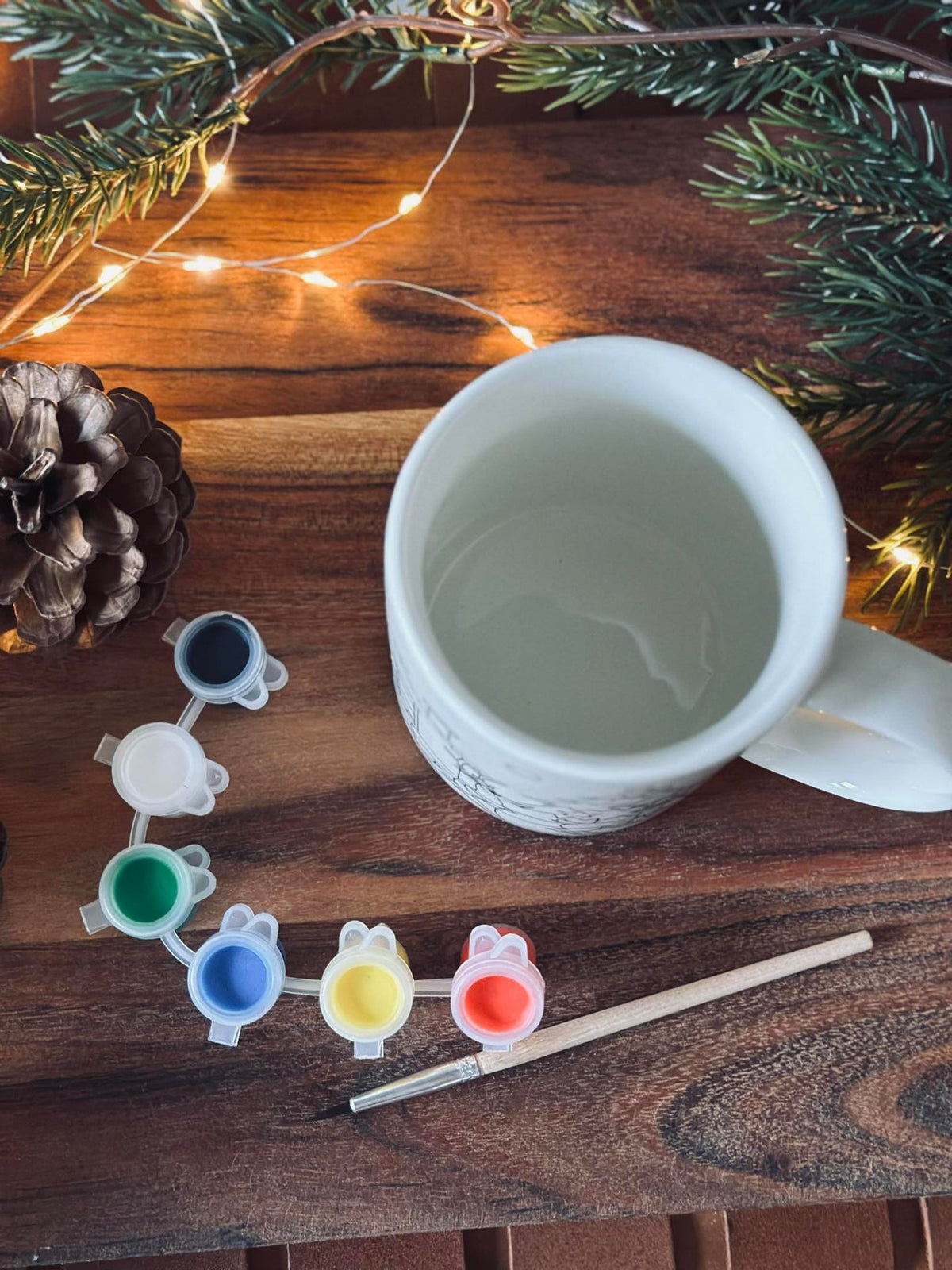 Kerstmok met verf