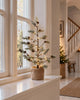 Kerstboom met kegels en lichtslinger - 70 cm