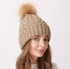 Muts met pompon - Beige