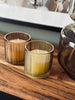 Kaars in gekleurd glas